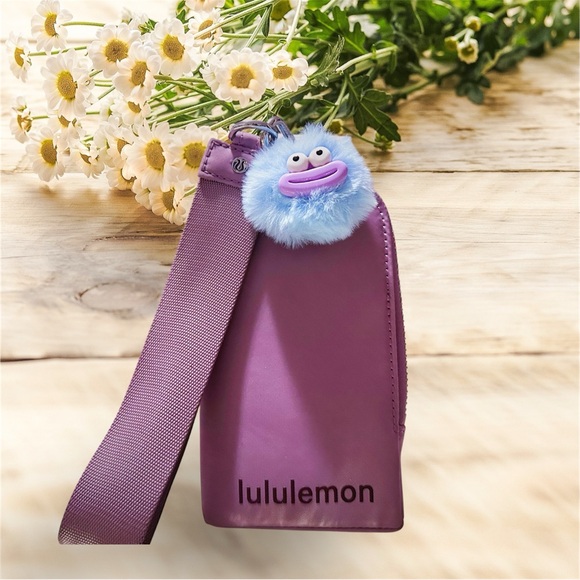 Lululemon Handbags - Lululemon Purple clutch wallet
